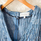 Veveret Floral Front Tie Denim Romper in Blue Floral (M)