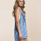 Veveret Floral Front Tie Denim Romper in Blue Floral (M)