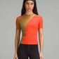 Lululemon Asymmetrical Ribbed Cotton T-Shirt in Solar Orange and Beige (XL)